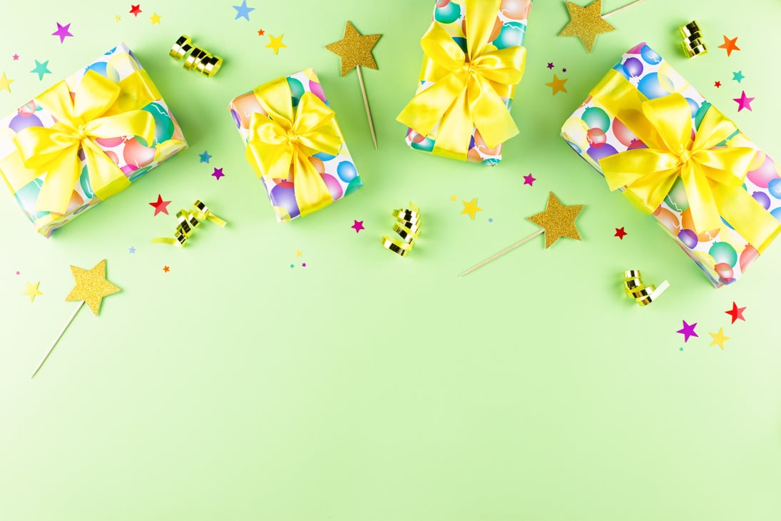 Festive Background with Birthday Presents and Confetti